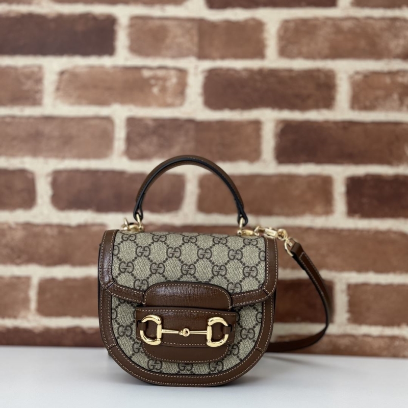 G*u*i top handle bags